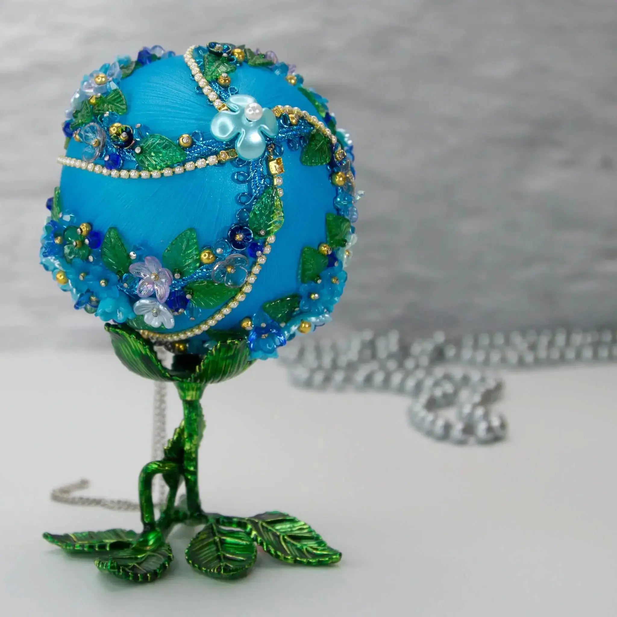 Christmas or Easter Beaded Satin Ornament Ball embellished with flowers, trim, and beads. Handmade. Top detail. (Sky Blue)