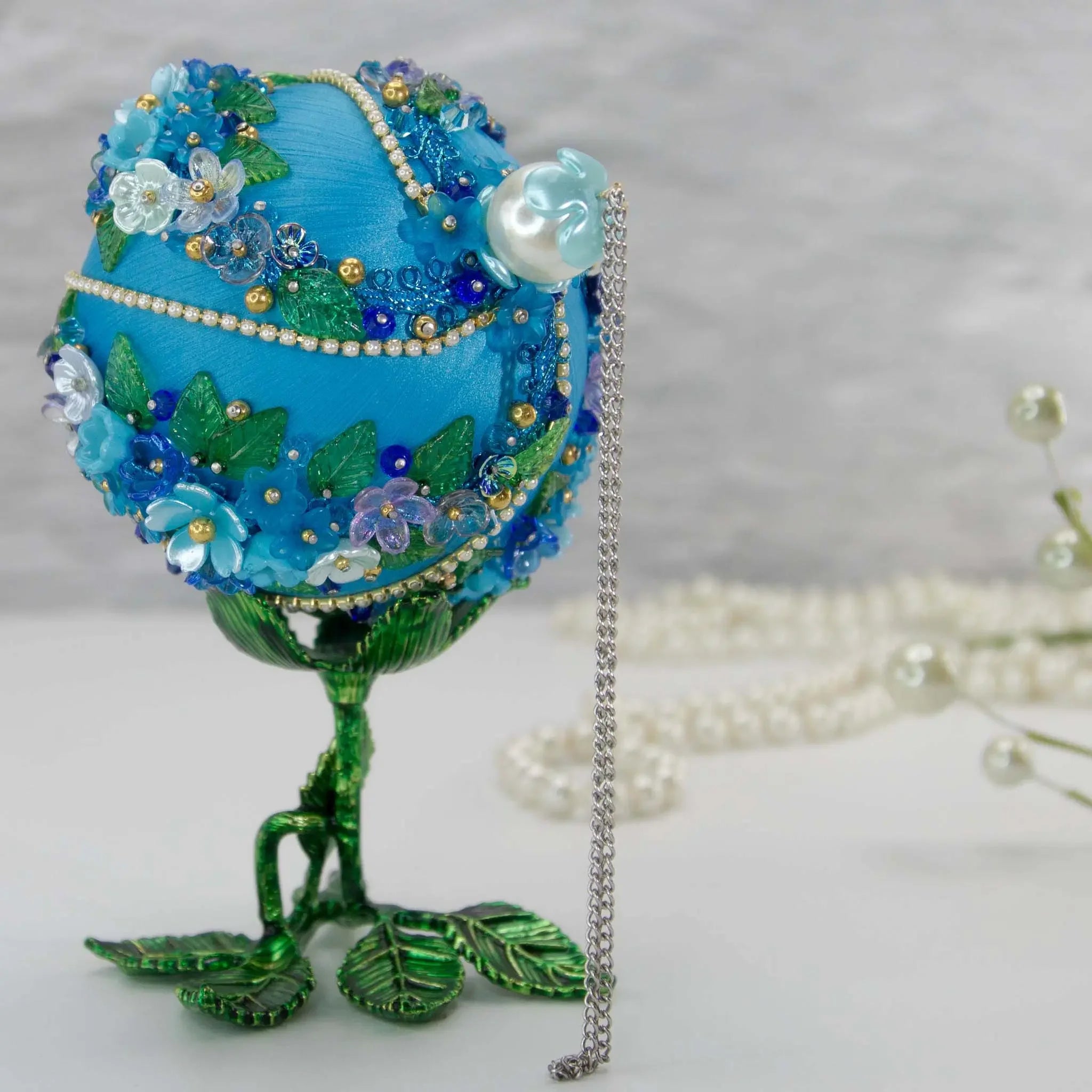 Christmas or Easter Beaded Ornament Ball embellished with acrylic  flowers, leaves, and crystal beads. Handmade. Top detail. (Sky Blue).