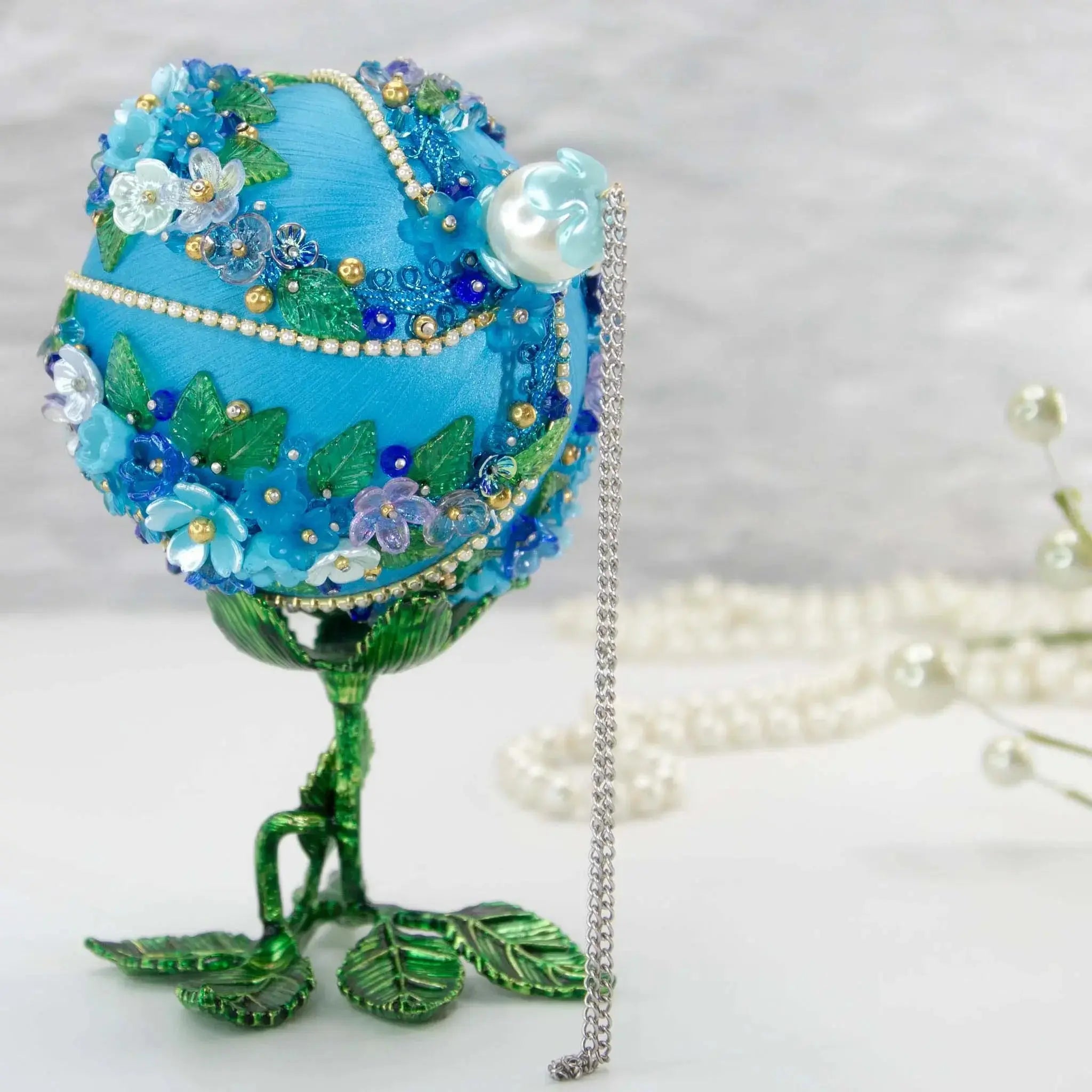 Christmas or Easter Beaded Satin Ornament Ball embellished with flowers, trim, and beads. Handmade. Top detail. (Sky Blue)
