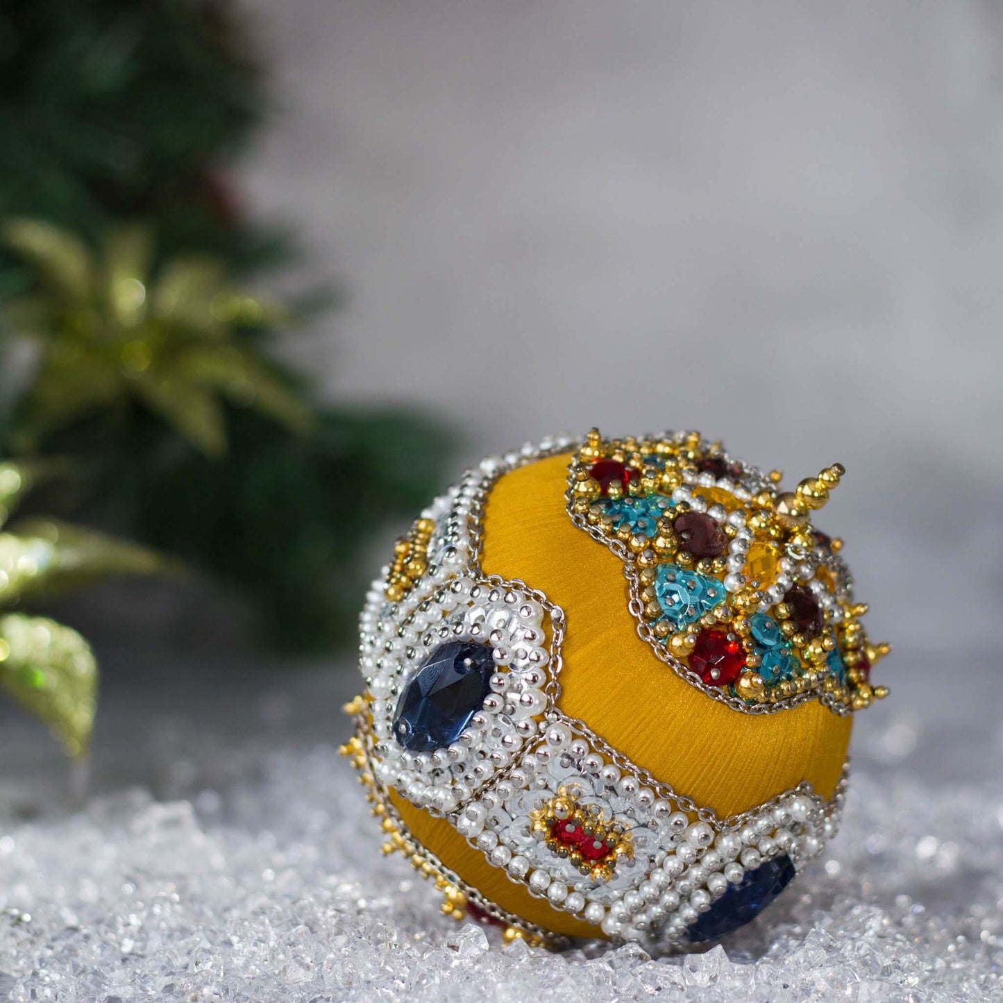 Gusornament Satin Ornament -Rich gold mustard beaded Christmas Ornament, pictured in sparkling crushed ice, adorned with glass rhinestones, hundreds of pearls and sequins, and a rose gold chain.  (Gold)
