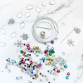 Load image into Gallery viewer, Jingle Bells Christmas Satin Ornament Kit-Materials include metallic cord, satin ball, sequins, crystal beads, rhinestones, and  alloy snowflakes.
