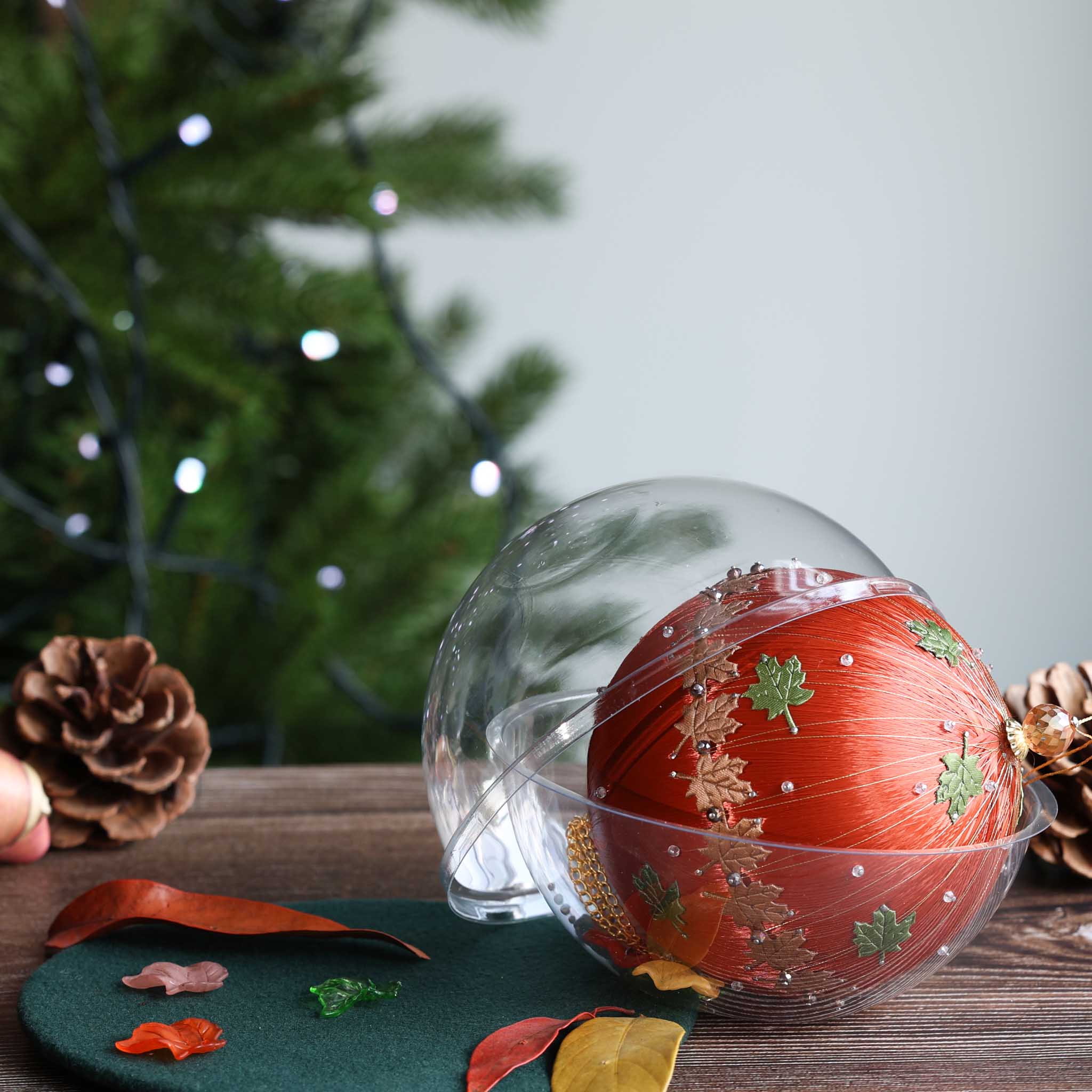 Finished satin bespoke Thanksgiving ornament in a clear container.