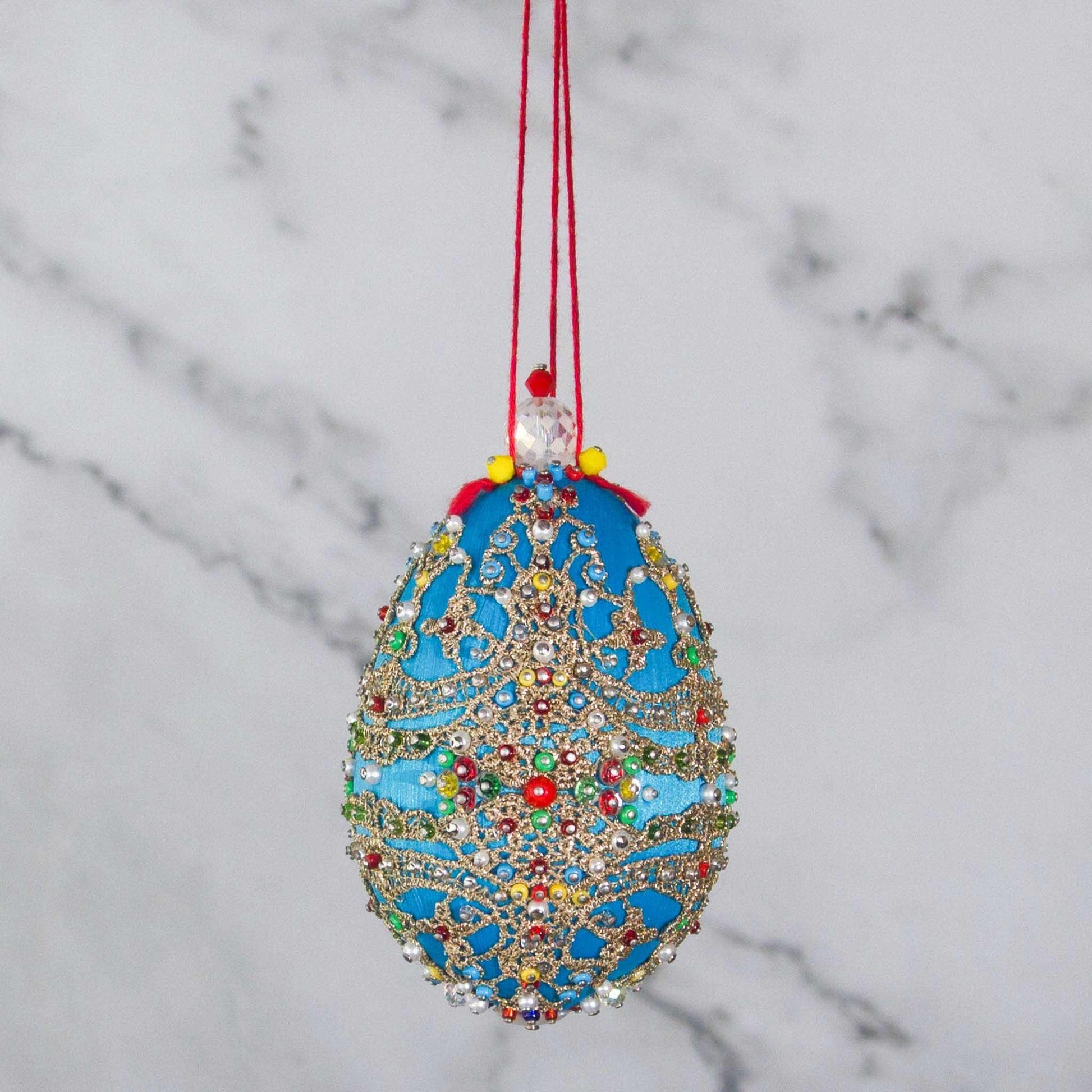 This Faberge Inspired Easter Egg Ornament kit is a true gem from Whim5seasons. Striking blue color contrasted with red and gold accents. (Sky Blue)