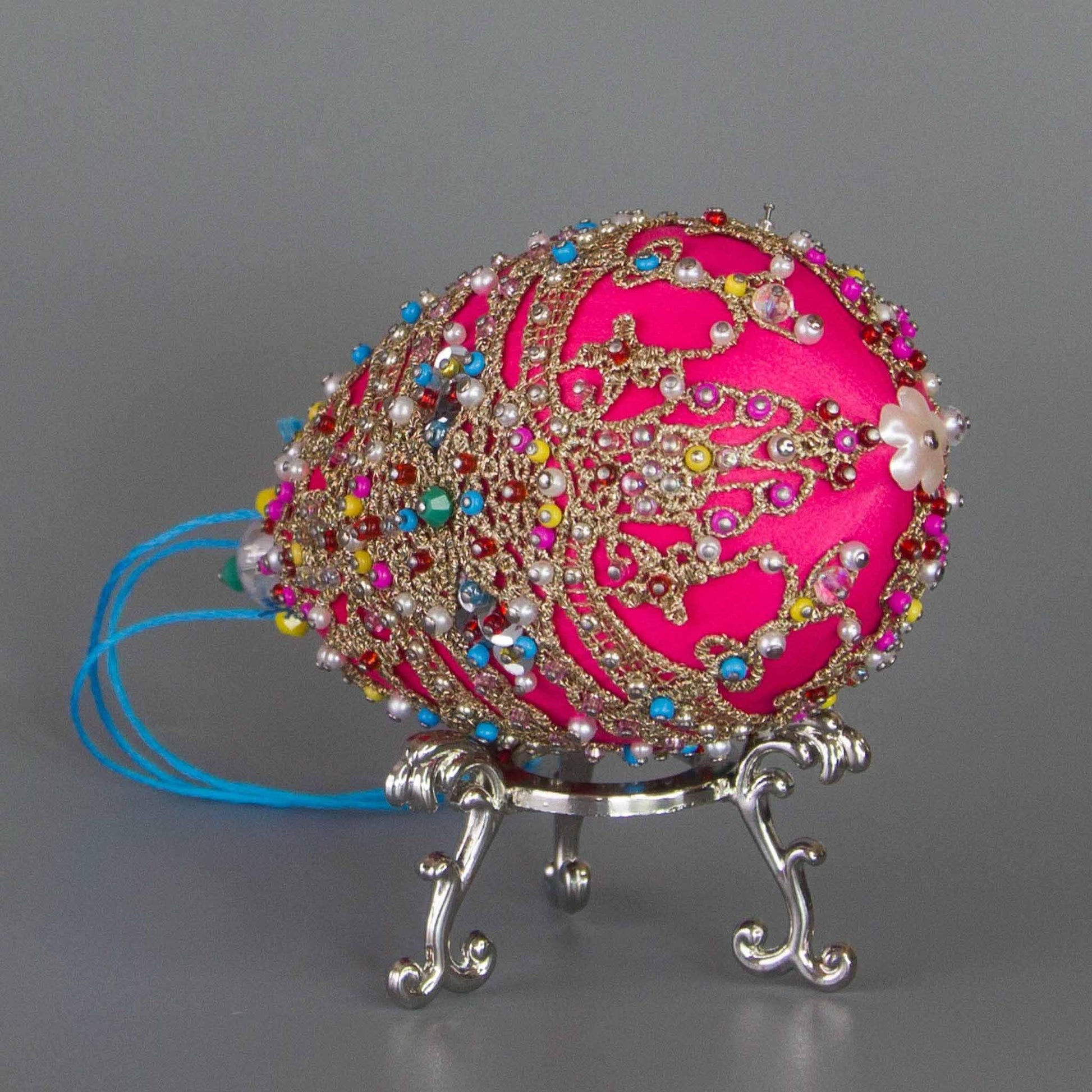 Bottom detail of a handmade Easter Beaded Ornament  from Whim5seasons -  carefully crafted using high quality seed beads, perals, and rose gold trim. (Deep Pink)