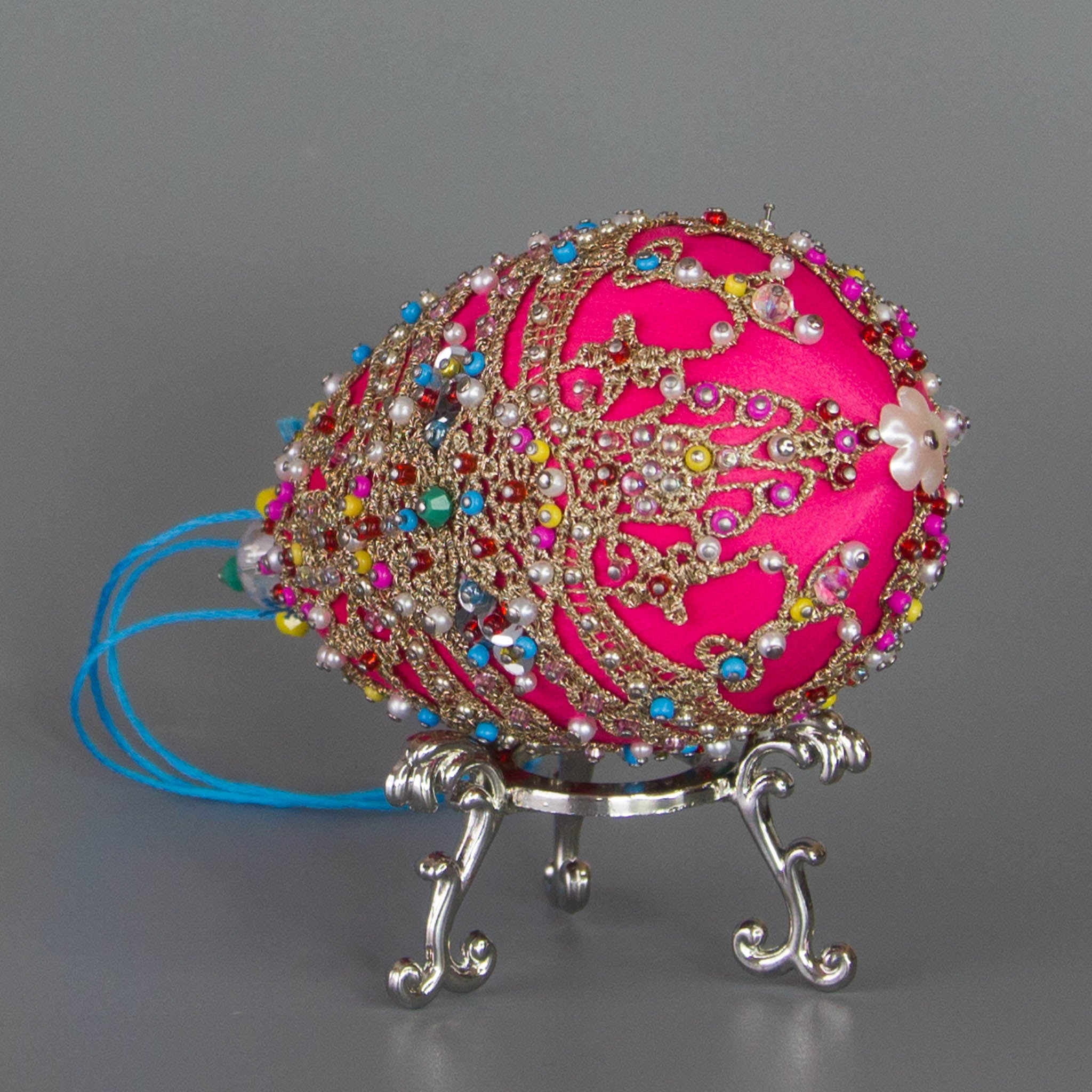 Bottom detail of a handmade Easter Beaded Ornament  from Whim5seasons -  carefully crafted using high quality seed beads, perals, and rose gold trim. (Deep Pink)