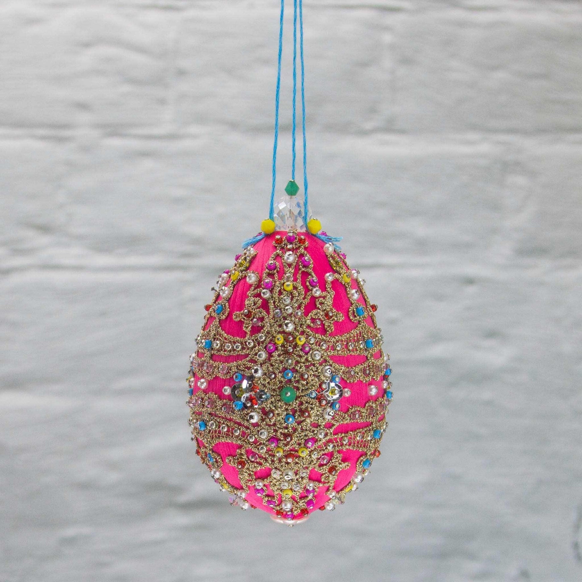 This Faberge Inspired Easter Egg Ornament kit is a true gem from Whim5seasons. Bright fuchsia color contrasted with blue and gold accents. (Deep Pink)
