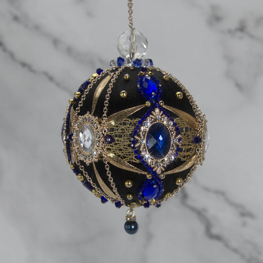 Phoenix Christmas Beaded Handmade Satin Ornament features large cameos with indigo rhinestones chains, gold alloy accents, and large crystal top bead. (Black)