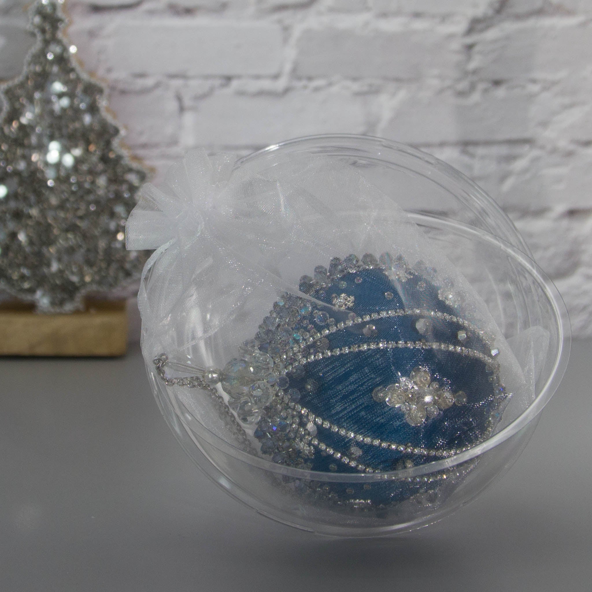 Polar Night Christmas Satin Ornament Kit - Packaging with Round Plastic Storage Container, finished ornament.

