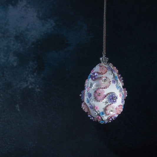 Princess Satin Egg Ornament -Elegant Handmade Easter decoration, adorned with sparkling beads, trims, rhinestones, and daisies, set against a dark background.