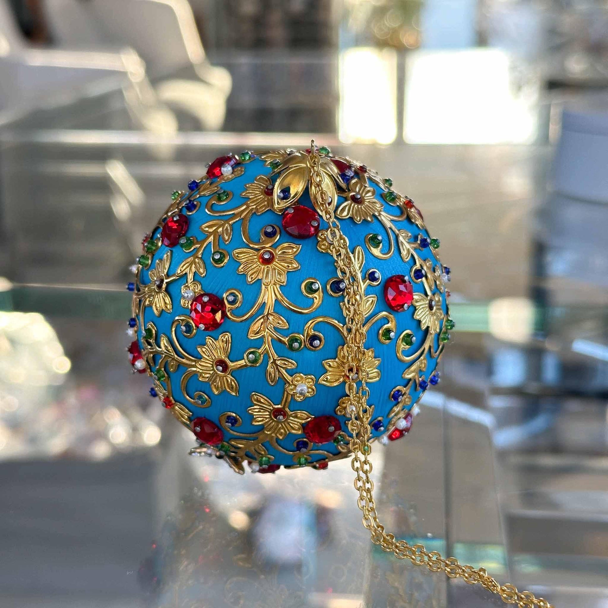 Close-up of Quam  - Handmade Ornament  from Whim5seasons. It will make a great gift - rich colors, gold accents, bee charm, festive design. (Sky Blue)
