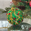 Load image into Gallery viewer, Quam Handmade Christmas Push Pin  Ornament in Green with gold metal embellishments and red rhinestones in front of evergreen branch. (Green)
