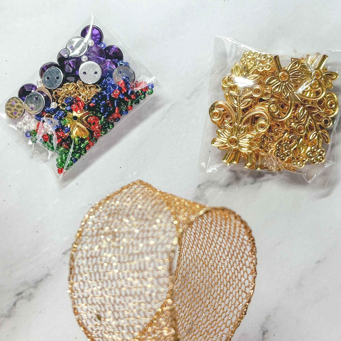 Quam Beaded Ornament Kit - Materials needed to complete 1 hour project: seed beads, gold metal stampings, purple rhinestones. . (Black)