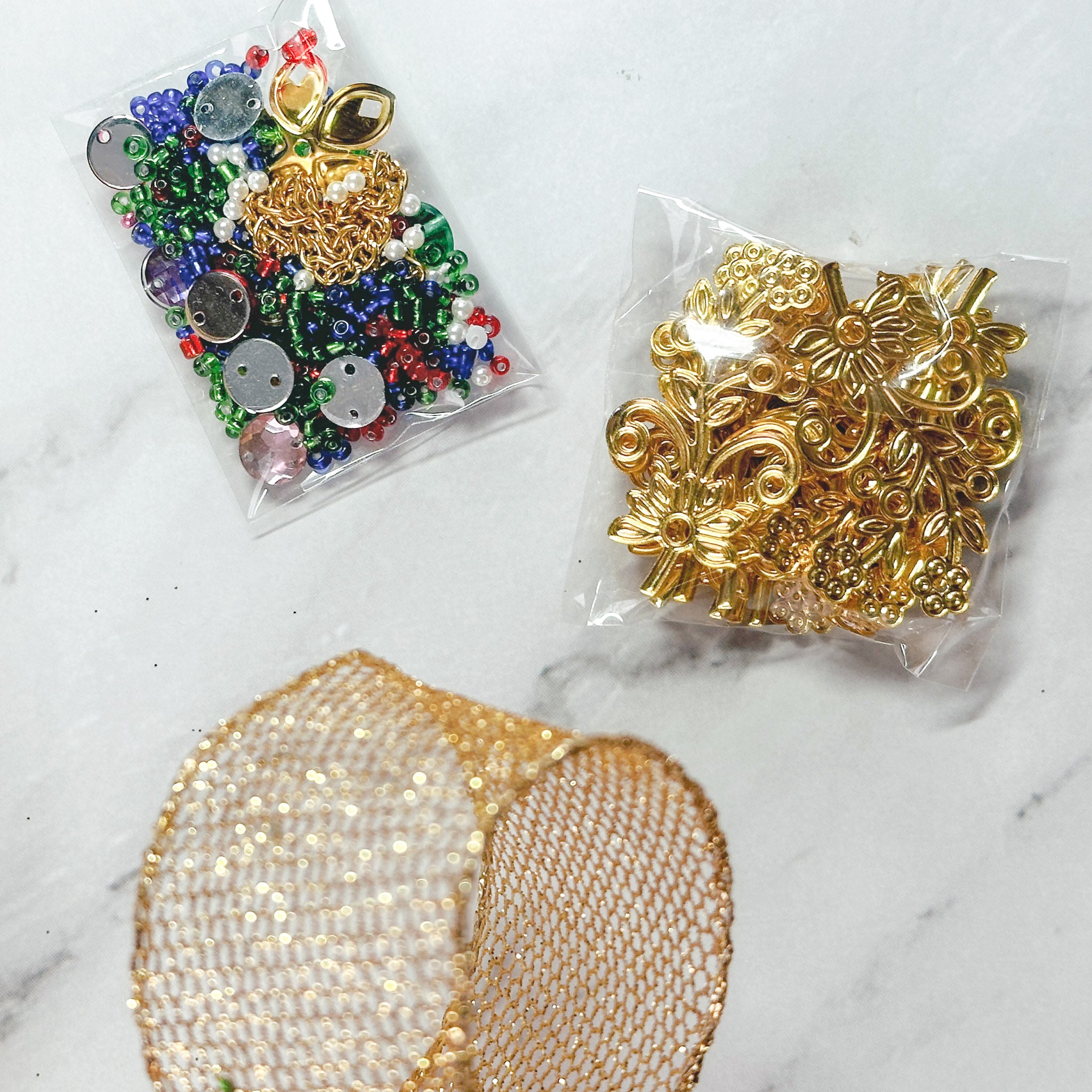 Quam Beaded Ornament Kit - Materials needed to complete the Beginner-Friendly project: beads, metal stampings, multicolor rhinestones. (Green)
