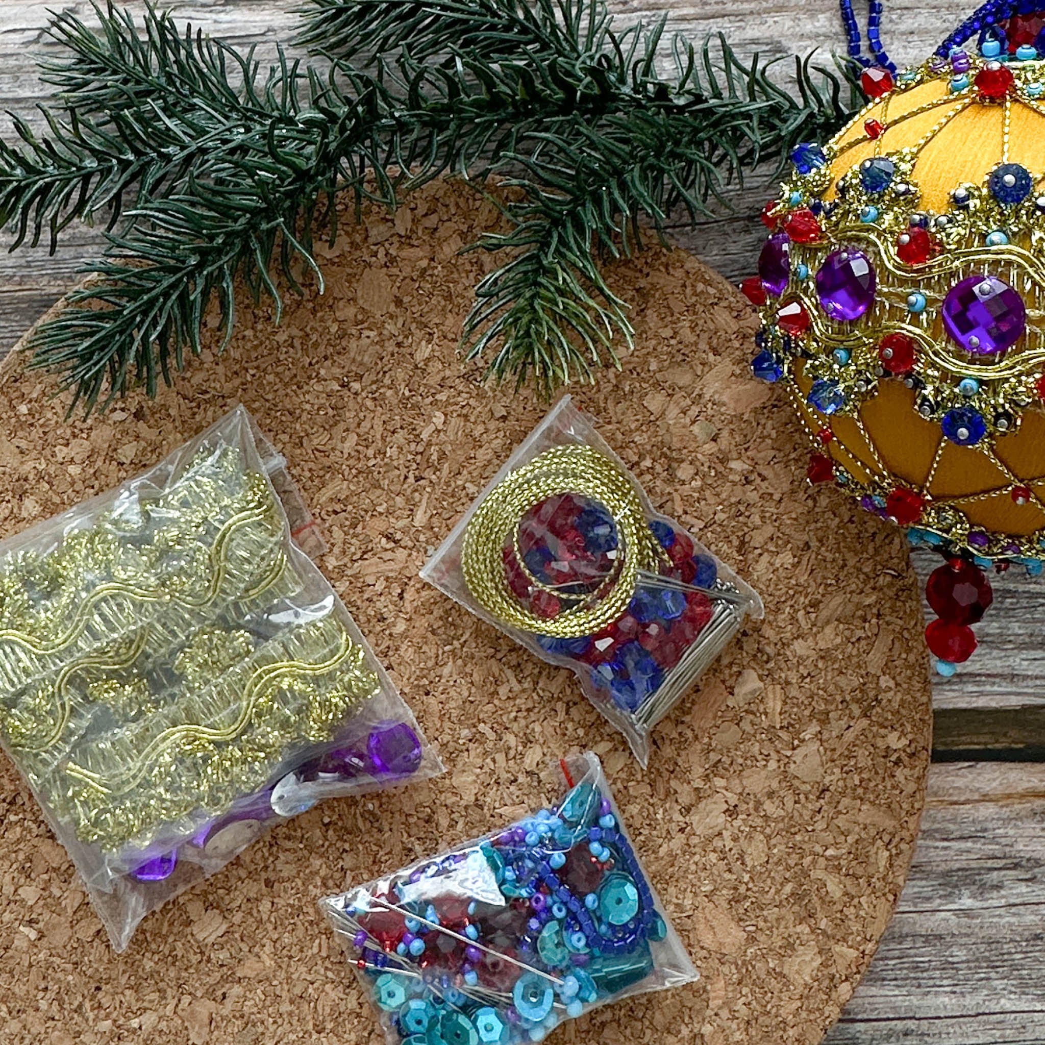 Scheherazade Handmade Satin Ornament  Kit- Everything you need to make an ornament using pins, mustard-colored ball, rhinestones, sparkling gold trim, sequins, indigo rhinestone chain. (Gold)