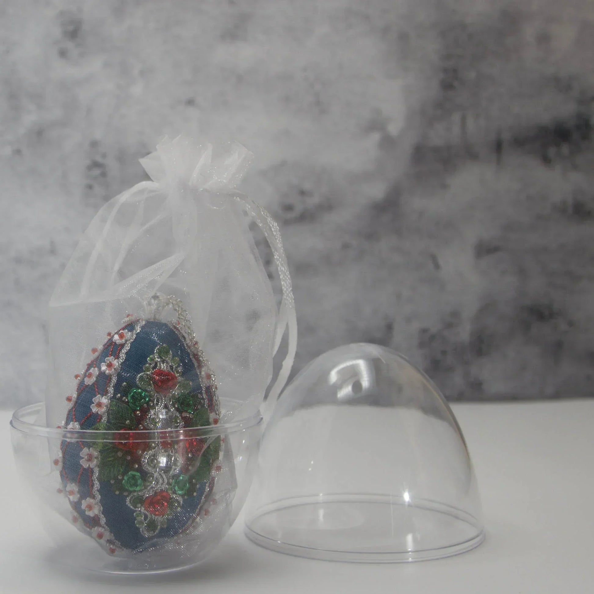 Easter or Christmas Beaded Ornament embellished with crystals, beads, and metallic trim .Packaging. (Dark Slate Blue).