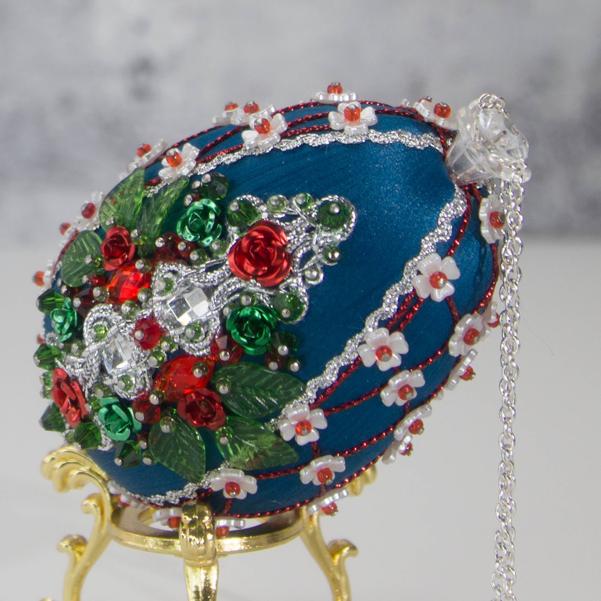 Easter or Christmas Beaded Ornament embellished with crystals, beads, and metallic trim . Bottom detail. (Dark Slate Blue).