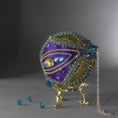 Load image into Gallery viewer, Christmas Beaded Ornament Kit Ball embellished with glass rhinestones, gold braided trim, and crystal beads. Top detail. (Indigo).
