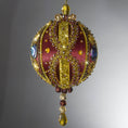 Load image into Gallery viewer, Christmas Beaded Ornament Kit Ball embellished with glass rhinestones, gold braided trim, and crystal beads. Front. (Maroon).
