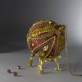 Load image into Gallery viewer, Christmas Beaded Ornament Kit Ball embellished with glass rhinestones, gold braided trim, and crystal beads. Top detail. (Maroon).
