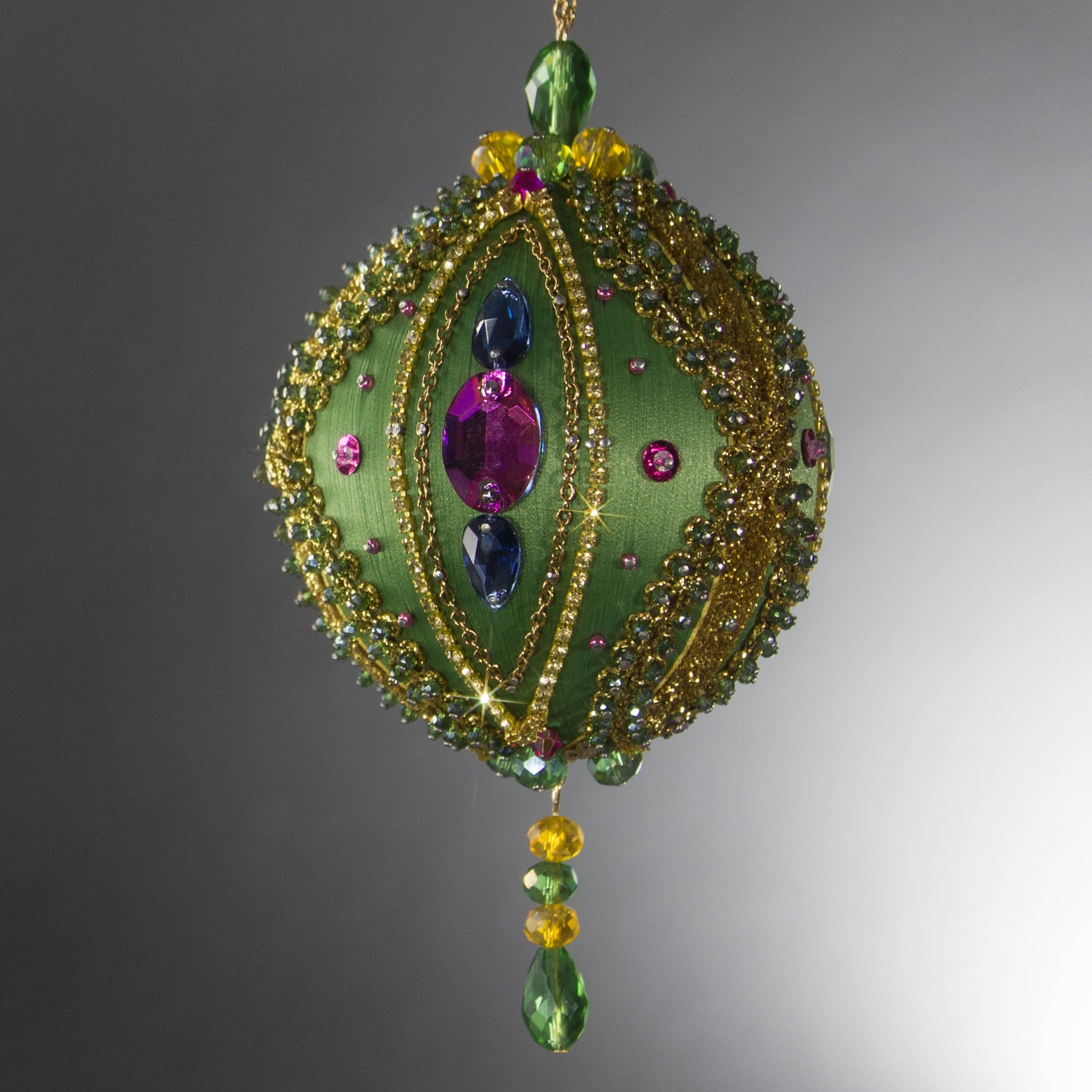 Christmas Beaded Ornament Ball embellished with large glass color-shifting rhinestones, gold braided trim, and crystal beads. (Olive).