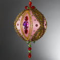 Load image into Gallery viewer, Christmas Beaded Ornament Kit Ball embellished with glass rhinestones, gold braided trim, and crystal beads. Front. (Light Pink).
