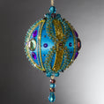 Load image into Gallery viewer, Christmas Beaded Ornament Kit Ball embellished with glass rhinestones, gold braided trim, and crystal beads. Front. (Sky Blue).

