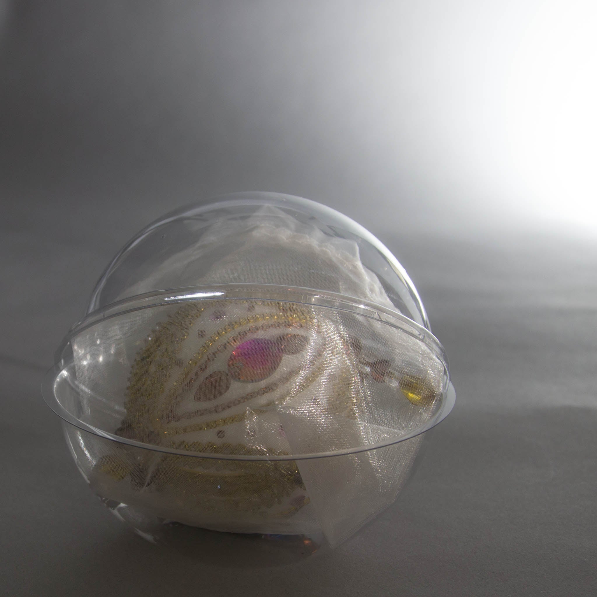 Handmade Christmas Beaded Ornament Ornament Uliger wrapped in organza and packed in a round clear container for storing. (White).