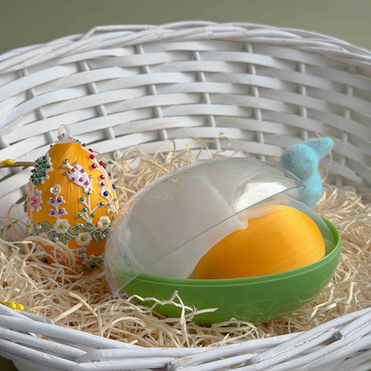 Decorative Easter egg push pin kit in a white wicker basket with straw. (Gold)