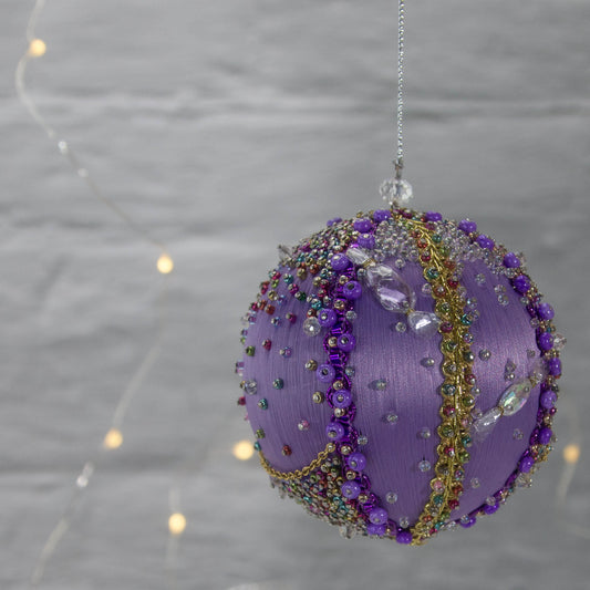 Front view of a Handmade Christmas Ornament Candy by Whim5seasons - Miyuki seed beads and gold trim applied one by one by hand. (Medium Purple)