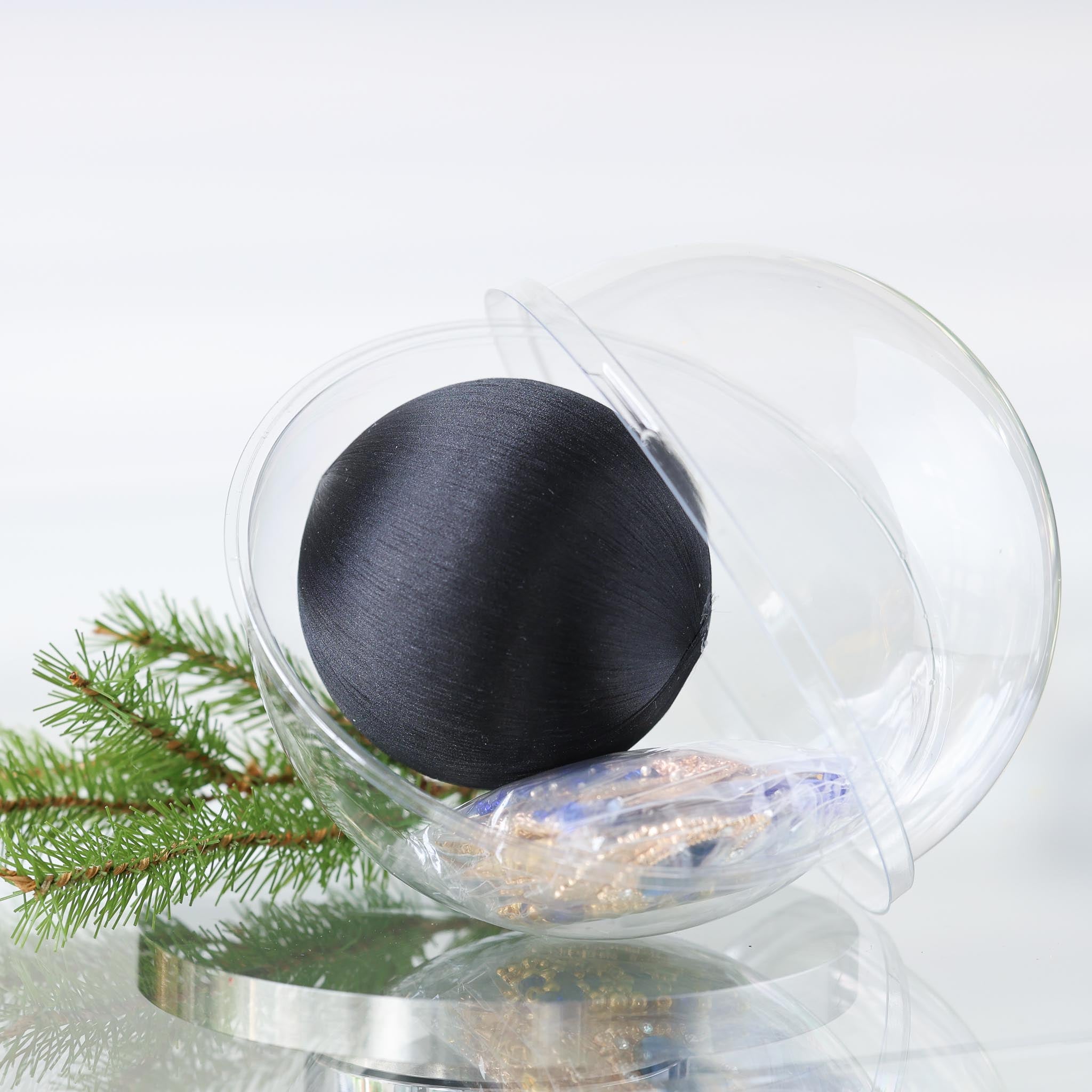 DIY Black Ornament Kit in a clear plastic container with a smooth satin ball, and push pin kit materials in a small clear bag on a white background with holiday greenery by Whim5seasons. (Black)