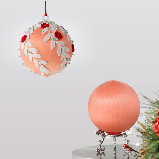 Two satin balls - one is a completed handmade push pin ornament, and the other is a green foam base to be used for a DIY Christmas craft project. (Coral)