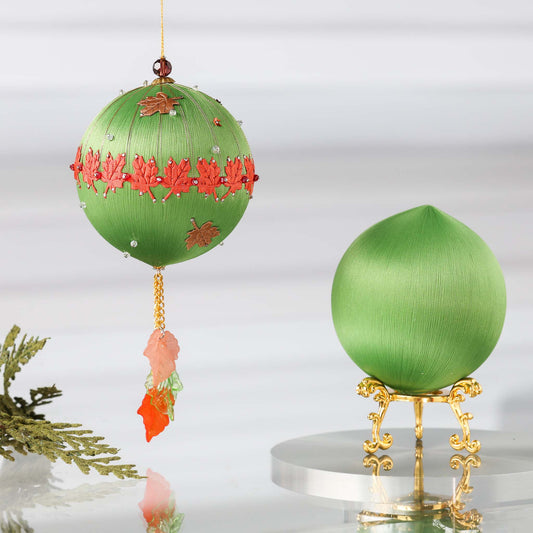 Push Pin Ornament Kit in olive color features maple leaf charms, leaf trim, and a satin foam core on a light gray background. (Olive)