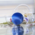 Load image into Gallery viewer, Blue Christmas push pin ornament kit inside a plastic clear round container featuring satin foam ball, dressmaker pins, and a bag with crafting materials. (Dark Slate Blue)

