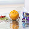Load image into Gallery viewer, Push Pin Ornament Kit in a clear plastic round container, which includes a mustard colored satin foam ball and a package with purple rhinestones, gold cord, and blue and turquoise beads. (Gold)
