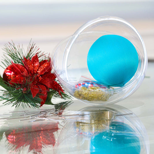 Bright teal satin foam ball with a bag containing some gold trims and beads inside a clear storage container makes a push pin ornament kit. (Light Sea Green)