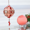 Load image into Gallery viewer, Two satin balls - one is a completed handmade push pin ornament, and the other is a coral-colored foam base to be used for a DIY Christmas craft project by Whim5seasons. (Coral)
