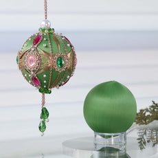 Two satin balls - one is a stunning handcrafted push pin ornament, and the other is a green foam base to be used for a DIY Christmas craft project by Whim5seasons. (Olive)
