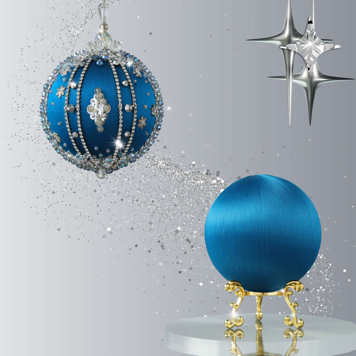 Two blue Christmas push pin balls, one on a stand is ready for a DIY ornament crafting, and one hanging, against a gray background with decorative elements by Whim5seasons.