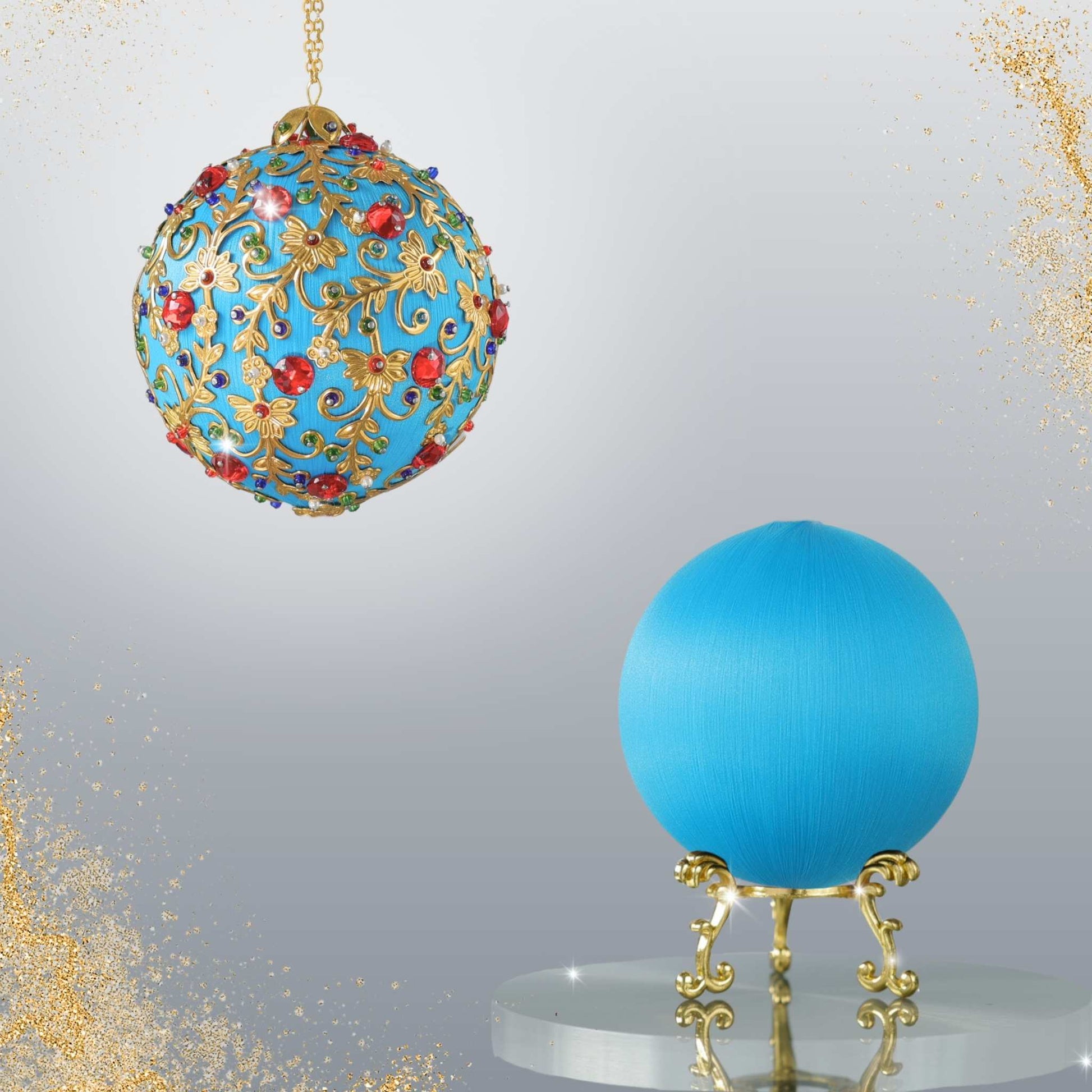 Quam Beginner-Friendly Christmas Push Pin Ornament Kit features sky blue color, gold metal stampings, red rhinestones, and gold chain. 