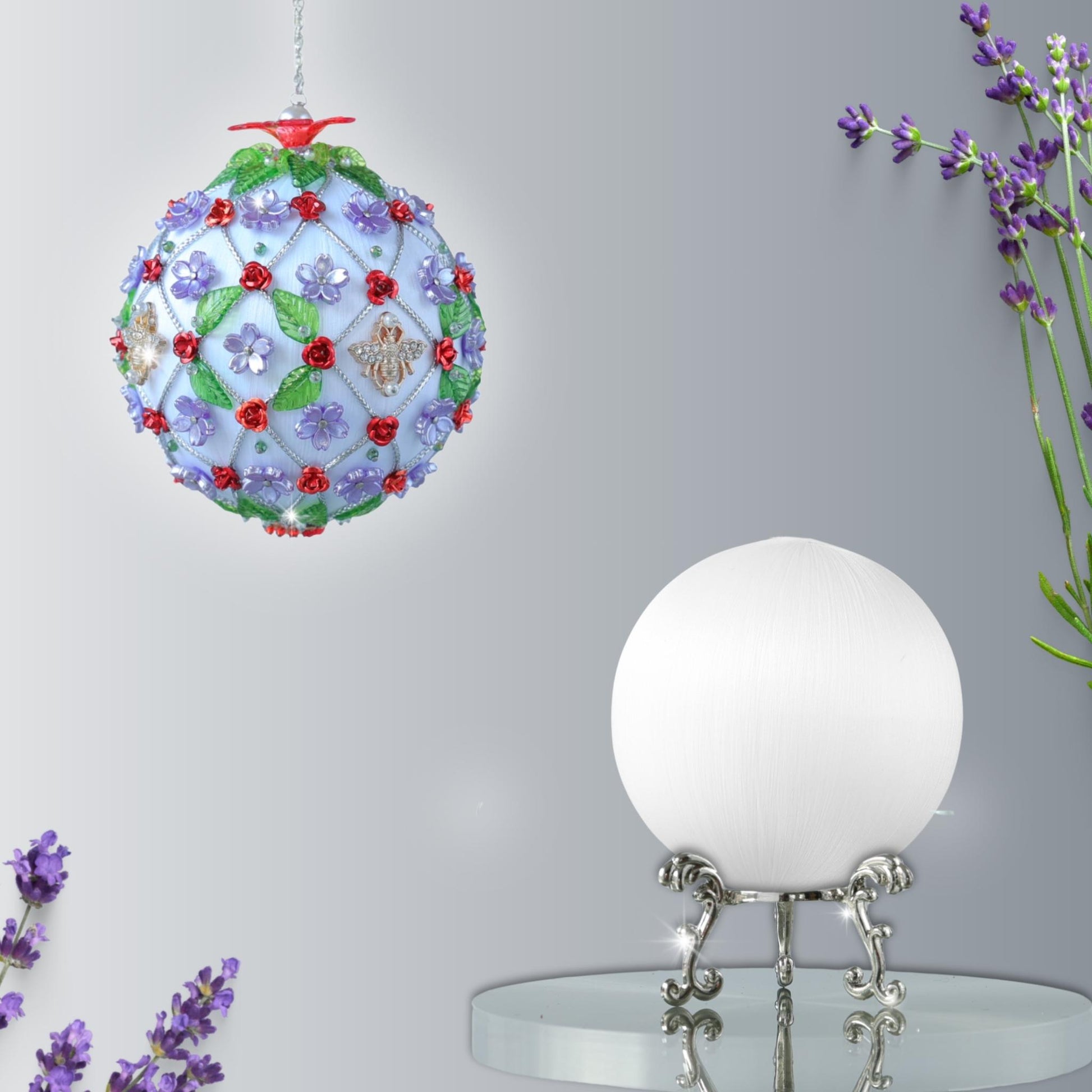 Push pin ornament kit ready to go: white satin  ball, crafting materials, clear container against a floral background. From whim5seasons.