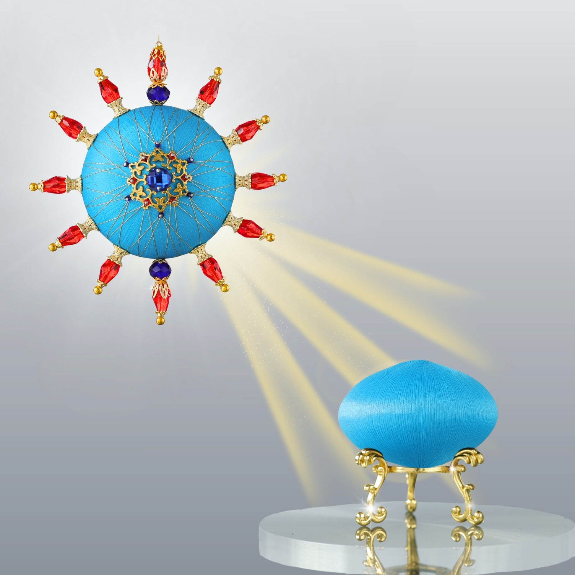 Sun-shaped bright and festive blue satin push pin ornament kit featuring a finished ornament and a saturn-shaped foam base for a project by Whim5seasons.