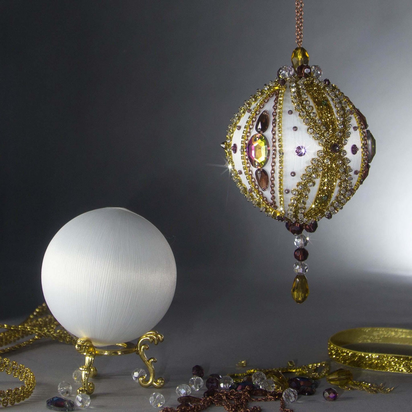 Satin Push Pin Ornament Kit showing two satin balls - on as a handcrafted completed ball decoration with beads and rhinestones, and the other ball is without embellishments by Whim5seasons.