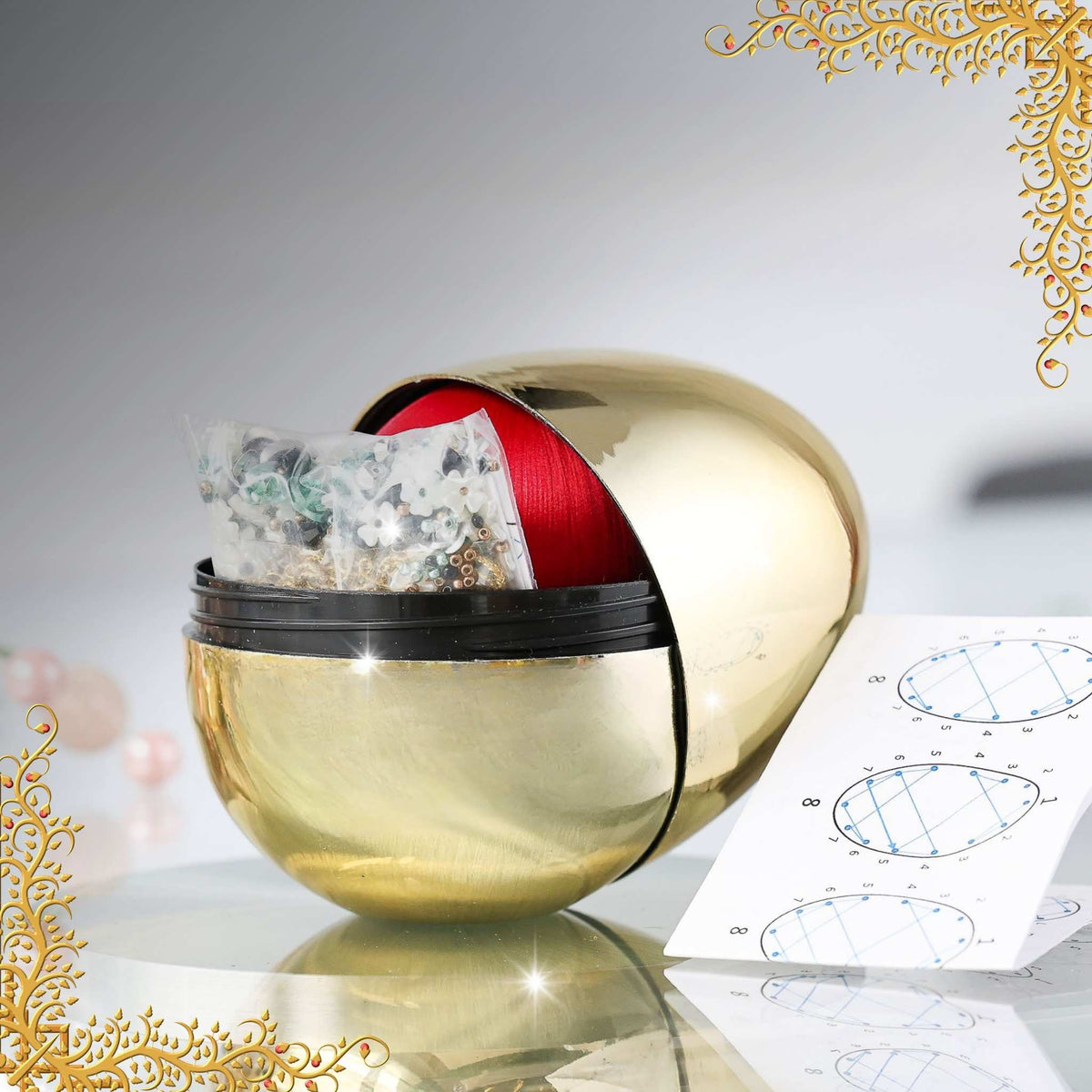 Easter Ornament Push Pin Kit Sonata comes in a gold storage container with premium red satin core and a bag of materials including black seed beads, pearls, and red beads by Whim5seasons.
