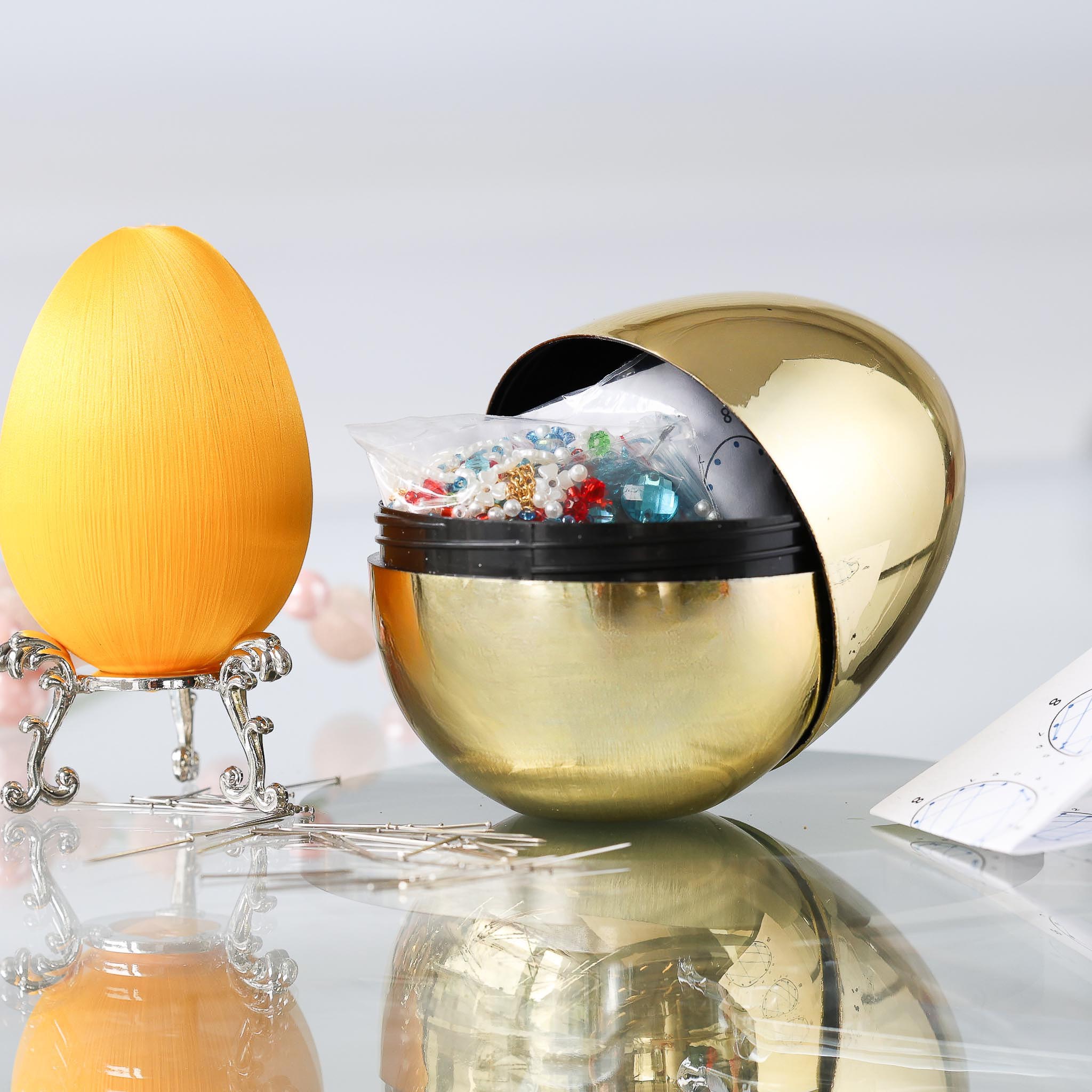 Easter Ornament Push Pin Kit Sonata comes in a gold storage container with premium satin core and a bag of materials including blue, pearl, and red beads.  (Dark Orange)