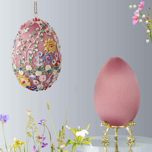 Large Easter egg push pin ornament  kit showing two satin eggs - one is a completed decoration with floral patterns against a neutral background. (Gold).