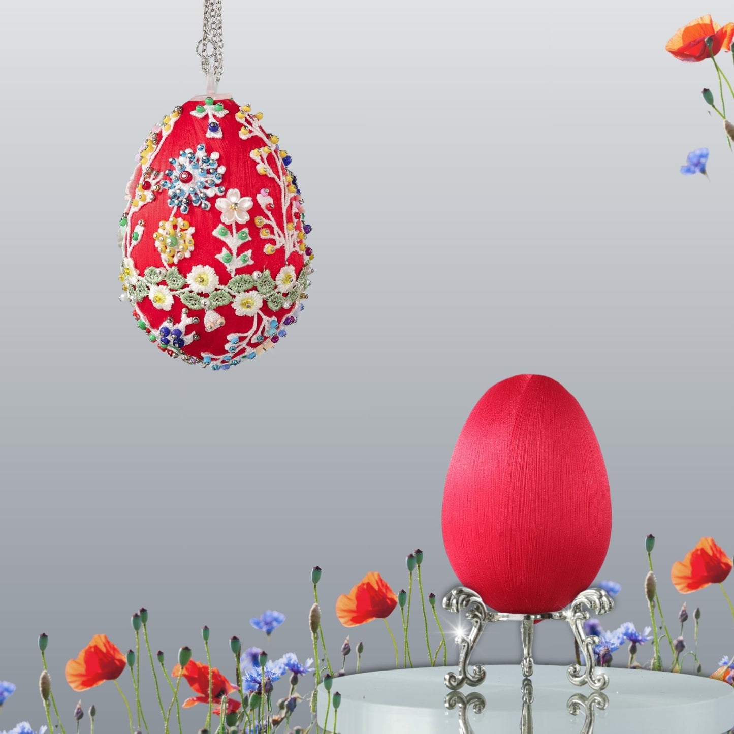 Red Easter egg push pin ornament kit  with floral patterns and colorful beads hanging on a chain against a neutral background by Whim5seasons.