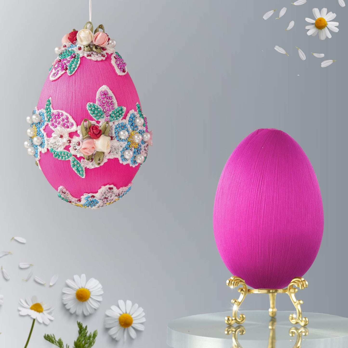 Large pink satin Easter egg push pin ornament kit with floral embellishments on a white background and a reflective surface by Whim5seasons.