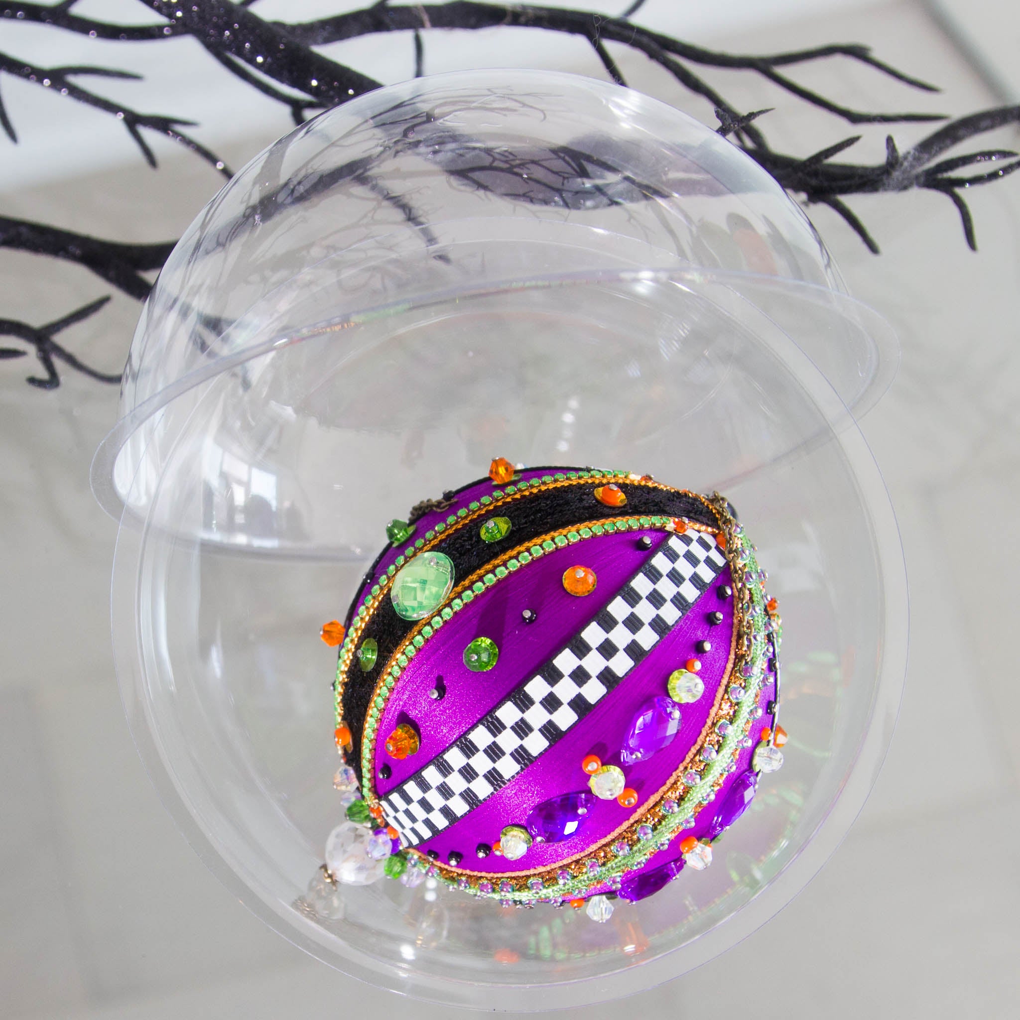 Fun bright purple Halloween ornament handmade by Whim5seasons packed in a clear container. (Indigo)
