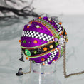 Load image into Gallery viewer, Top large bead detail of Halloween handmade ornament adorned with mini witch hat charms. (Indigo)
