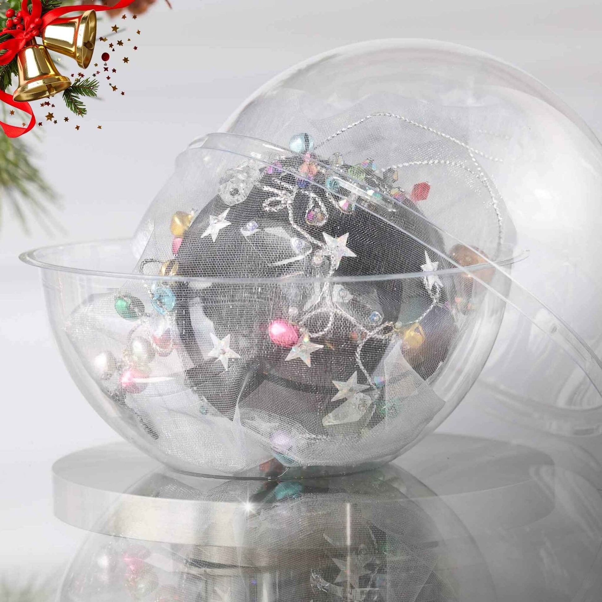 Handmade completed Christmas push pin satin ornament with silver star sequins inside a round clear storage container, with a pinecone on a light background.